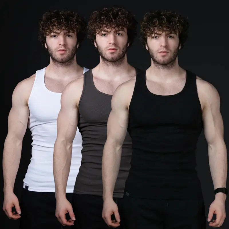 Men’s versatile tank top that smooths bulges and enhances a strong, athletic fit.