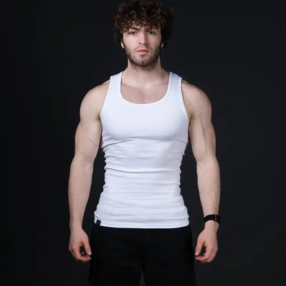 Men’s versatile tank top that smooths bulges and enhances a strong, athletic fit.